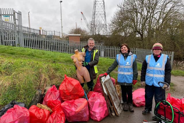 The volunteers with all the rubbish they collected on the day.