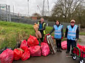 The volunteers with all the rubbish they collected on the day.