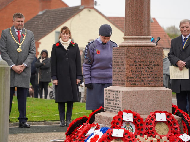 Coningsby's Air Cadets were among those that laid wreaths at the memorial in the village. Photo: Keith Bishop