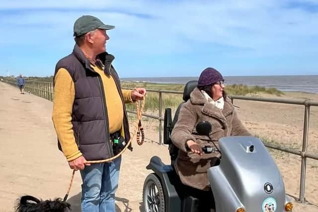 Mandy Pemberthy and husband Mark, who live at Anderby Creek, are full of praise for the accessibility improvements. (PHOTO BY: Lincolnshire County Council)