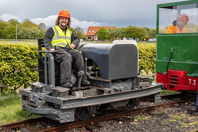 Volunteer Stuart Yates on the loco as it’s readied for the move into the LCLR’s yard and shed (Photo: Dave Enefer/LCLR)