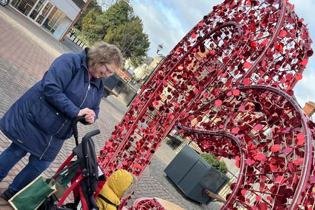 Get a free Valentine's photo at the heart seat in Sleaford.