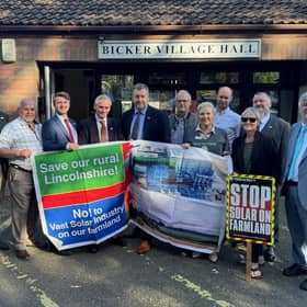 County councillors joined residents outside Bicker Village Hall to announce the legal challenge. the solar farm would link up to the grid at a substation near Bicker. Photo: LCC