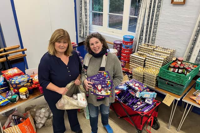 Karen Holland and Isabel Forrester of the Community Larder with their festive donations.