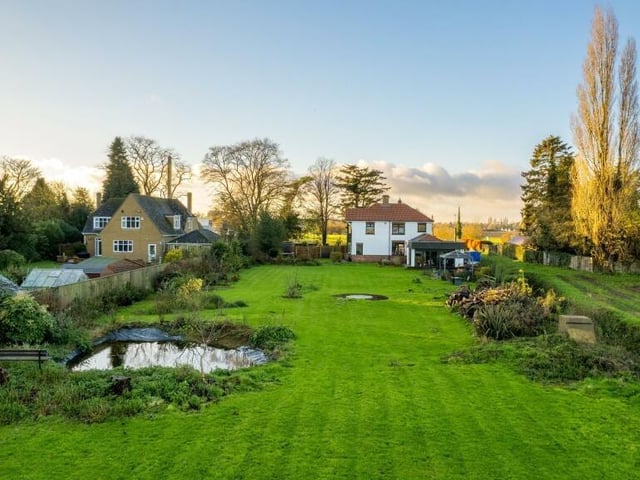 Looking back at the home from across the garden.