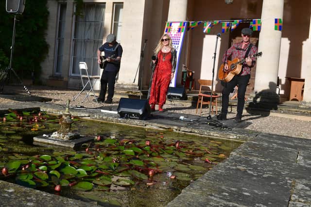 Jock McClelland and friends performing on the Terrace Stage.