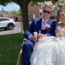 Shan Chapman and Max Foreman in the trishaw that took them to their reception at Shaxfest.