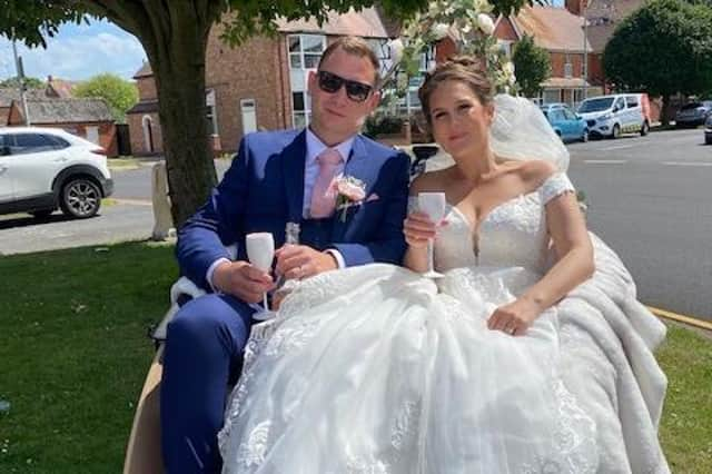 Shan Chapman and Max Foreman in the trishaw that took them to their reception at Shaxfest.