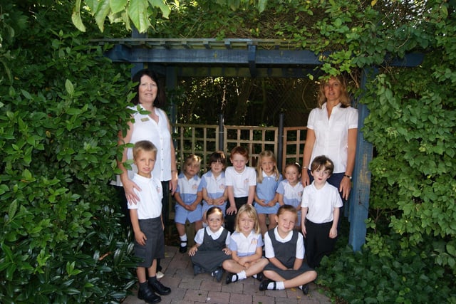 The new reception class at Grasby CofE School 10 years ago with class teacher Jude Levy (right) and teaching assistant Cathy Lewis.