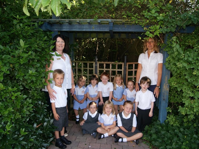 The new reception class at Grasby CofE School 10 years ago with class teacher Jude Levy (right) and teaching assistant Cathy Lewis.