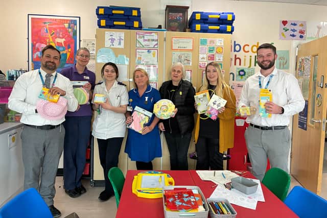Team from BT Lincoln donating Easter Craft Kits to staff at Rainforest Children's Ward, Lincoln County Hospital.