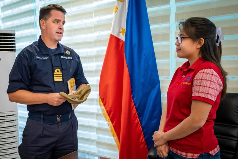 Capt. Joseph Dransfield, Pacific Partnership 2023 deputy mission commander, talks with Gov. Raphaelle Veronica Ortega-David, Governor of the Province of La Union, Philippines.