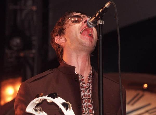 Liam Gallagher on stage at Sheffield Arena in 1997. Picture: Dean Atkins.