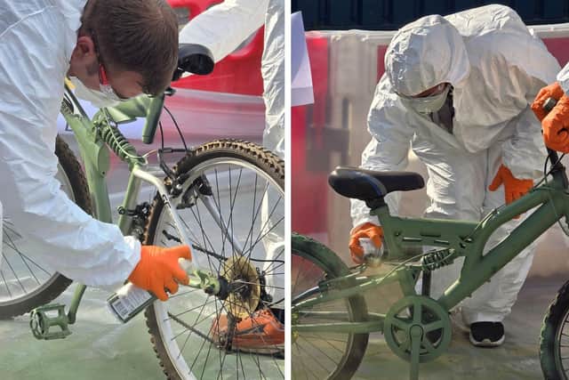 Bike's being sprayed green for display along the race route
