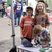 Having a look at Nature Labs, from left:Teddy Farr, 6, Archie Farr, 10, and George Farr, 4. Photos: Holly Parkinson