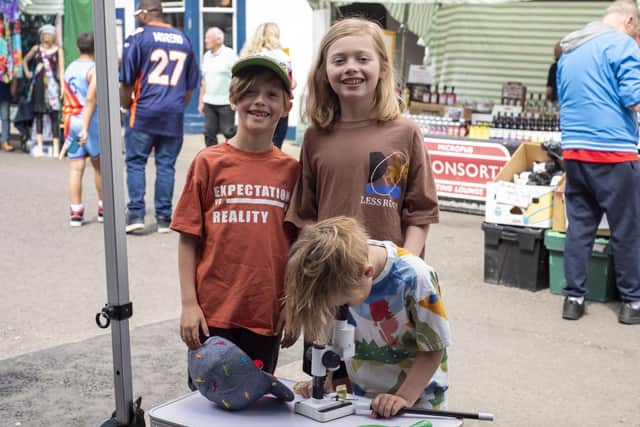Having a look at Nature Labs, from left:Teddy Farr, 6, Archie Farr, 10, and George Farr, 4. Photos: Holly Parkinson