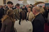 Twenty-year-old entrepreneur Harrison Towers, from Tetford, chats to Princess Anne during the event in London.