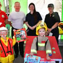 The winners of the fancy dress competition at Marshall’s Yard’s Emergency Services Day event