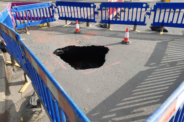 The sinkhole, fenced off, at the London Road end of West End Road, Wyberton.