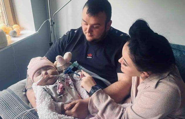 Gracie-Mae with her parents Jordan and Jesica.