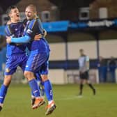Gregg Smith celebrates his second goal during Tuesday's 4-1 victory over Radcliffe with recent signing Jack Walters. PHOTO: John Rudkin
