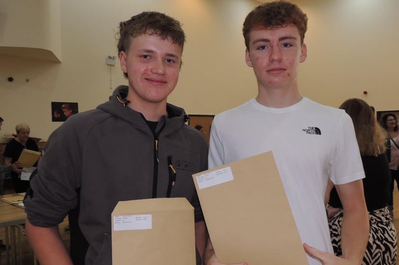 The wait is over - from left - Sam Bailey and Dylan Parr collect their GCSE results at St George's Academy.