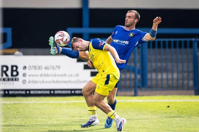 High-flying action from Trinity's 1-0 home loss to Bury on Saturday - report inside. Photo by Sean Cook, Foxby Media.