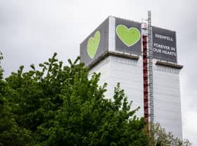 The covered structure of Grenfell Tower in London Photo by Leon Neal/Getty Images
