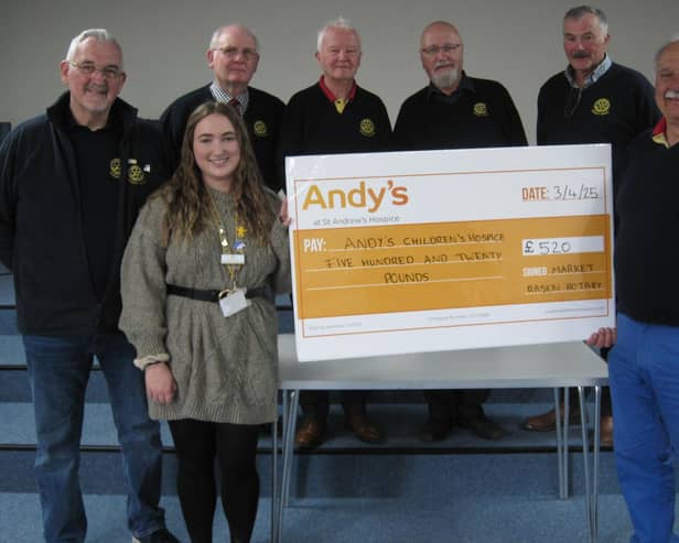 Rhea Harvey from St Andrew’s Hospice with the donation from Market Rasen Rotary Club.