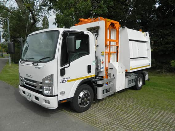 A specially adapted food waste collection vehicle used during the trial.