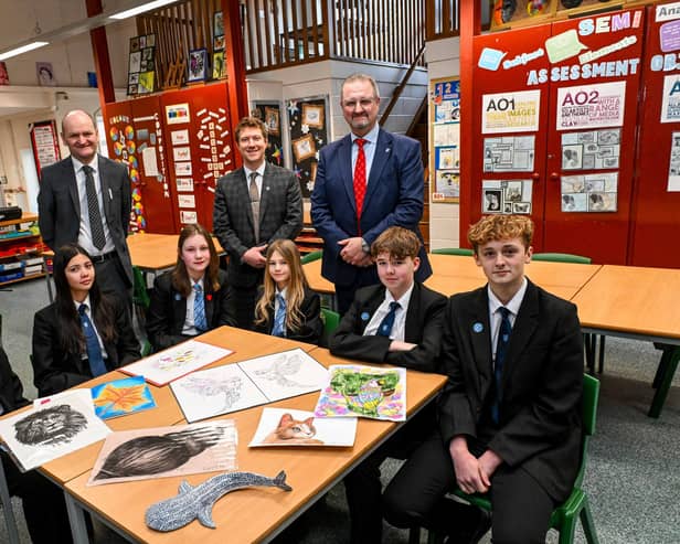 Principal Jake Bailey (centre, back) flanked by Chair of Governors Rik Coleman (left) and Chief Executive Officer of Lincolnshire Gateway Academies Martin Brown celebrate the Ofsted with students (left to right) Billy Aston, Lidya Spencer, Beth Marshall, Lucinda Cooper, Jake Bains and Phoenix Russell.