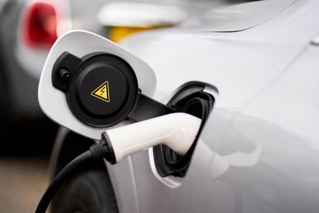 File photo dated 05/03/21 of a car being charged using a Ubitricity lampost EV charging point in London, as waiting times for electric vehicles have fallen for the sixth month in a row as 'supply chain issues ease and demand slows', according to new data. Buyers of electric cars will now have to wait an average of five months to get the keys to their new car with waiting times down by 42 per cent since their peak in October 2022. They're also down by 20 per cent on the same period in February. Issue date: Friday May 5, 2023.