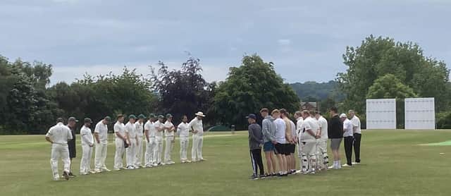 The players hold a one minute silence for the Nottingham atrocities.
