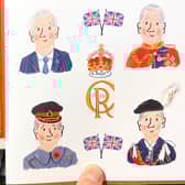 Lucy Dillamore's illustrations of King Charles III on a greeting card.