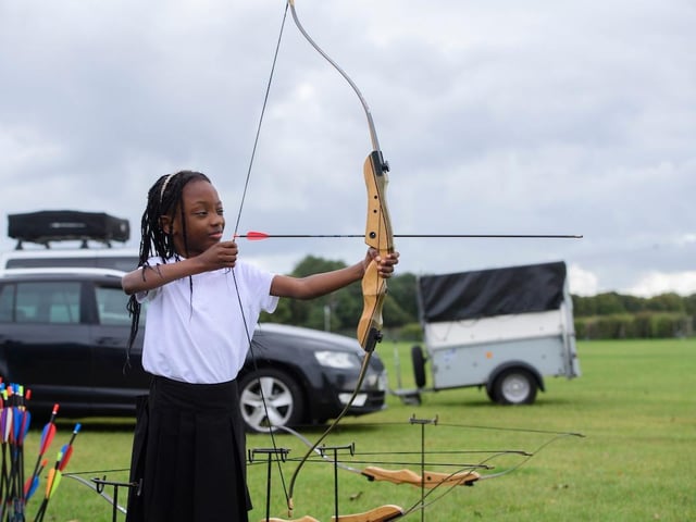 Kids had a go at outdoor activities including archery run by Lincoln based On Point Archery