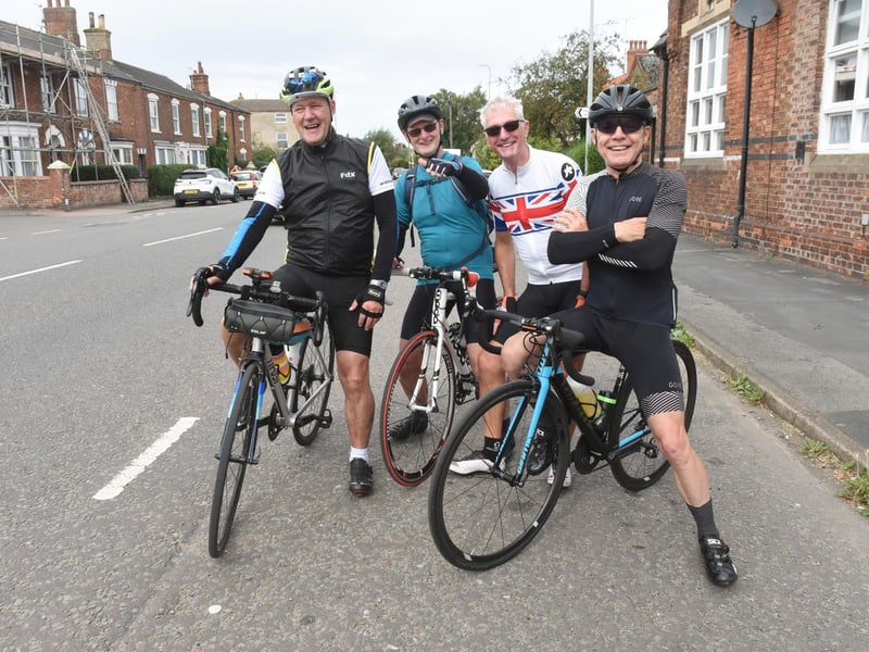 Admiring the professionals. Dave Clarke, Colin Richards, Neal Fussey and Darren Busby who cycled to Market Rasen from Brigg, they were then heading to Lincoln to see the finish.