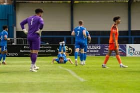 'The Worm' re-emerges as Declan Howe opens the scoring for the Holy Blues. Photo by Tommy Cox.