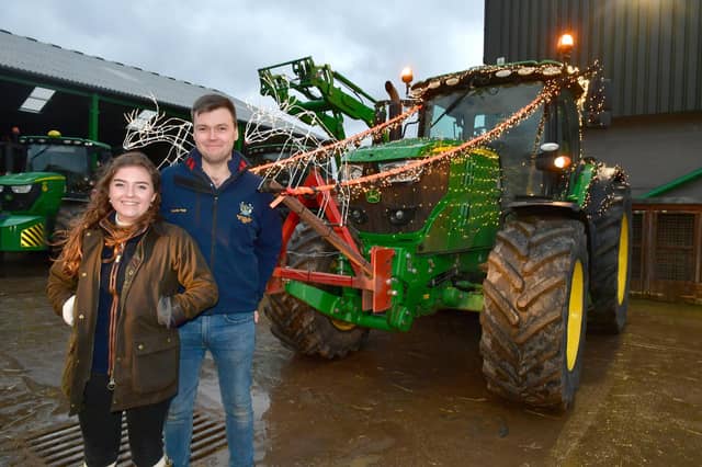 Best decorated tractor winner Charles Tagg and Imogen Vickers of Candlesby. Photo: David Dawson