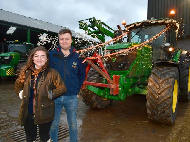 Best decorated tractor winner Charles Tagg and Imogen Vickers of Candlesby. Photo: David Dawson