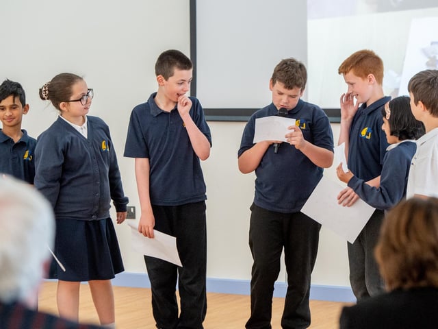 Children form Bubble bees Class read a poem and welcome the visitors.