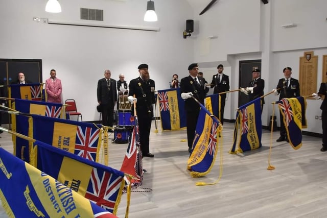 Thirteen standards from across Lincolnshire were lowered during the Last Post.