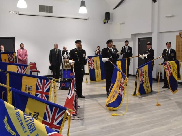 Thirteen standards from across Lincolnshire were lowered during the Last Post.