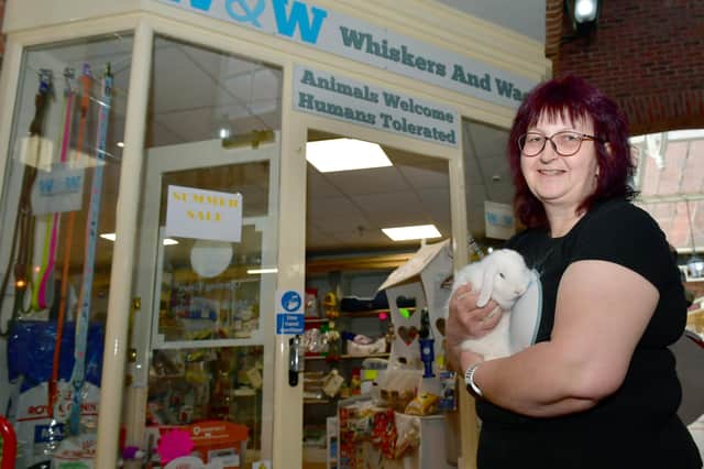 Owner of Whiskers and Wags, Theresa Appleton with Pompom the therapy rabbit.