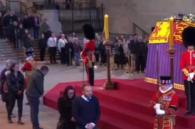 Ady Findley bowing his head at the coffin of Queen Elizabeth 11 in Westminster hall.