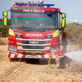 Firefighter from Louth Fire station tackles the fire at Gayton Top.