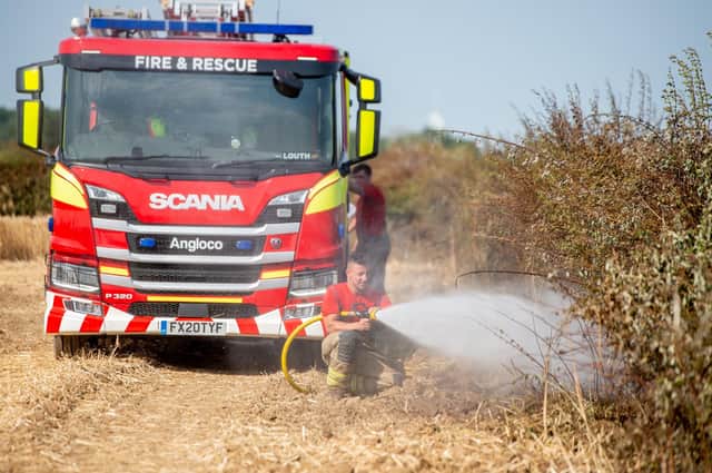 Firefighter from Louth Fire station tackles the fire at Gayton Top.