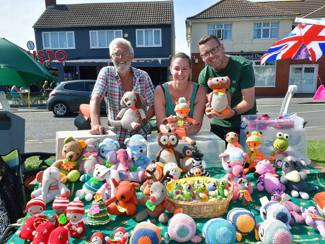 Brian Sarson, Sonia Sarson and Richard Sarson selling their Amigurumi toys