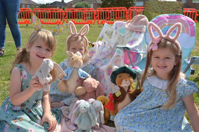 Ophelia Franklin (5), Tilly Crowe (3) and Florence Crowe (4) took their rabbits along to watch the play too
