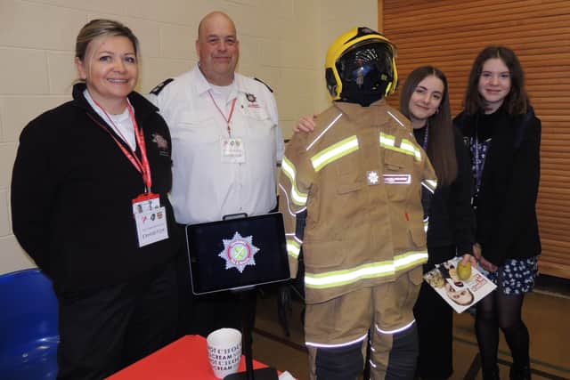 Lincolnshire Fire and rescue watch managers Julia Whitfield and Phil Siddall with sixth formers Scarlett Marriott and Bea Harris.