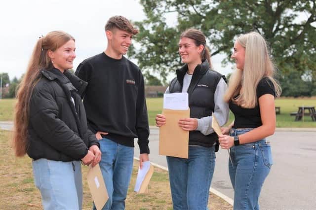Students at Queen Elizabeth Grammar School in Alford celebrating their A-Level results.